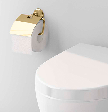 Close up of VitrA Juno gold toilet roll holder